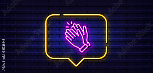 Neon light speech bubble. Clapping hands line icon. Clap sign. Victory gesture symbol. Neon light background. Clapping hands glow line. Brick wall banner. Vector