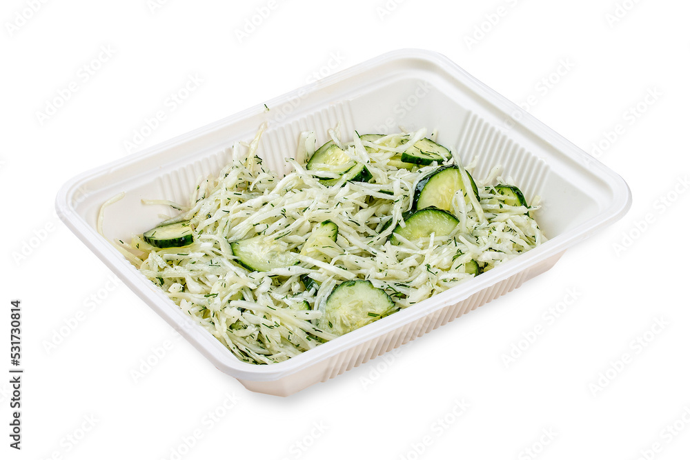 Salad with fresh cucumbers and grated cheese. In a plastic container. Food to go. On a light background. Salad with fresh cucumbers and grated cheese. In a plastic container. Food to go. On a light background.