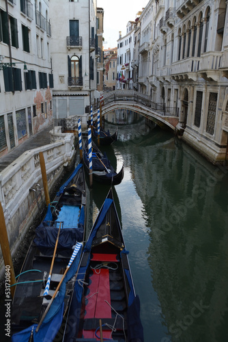 Scenic canal with gondola, Venice, Italy, in summer