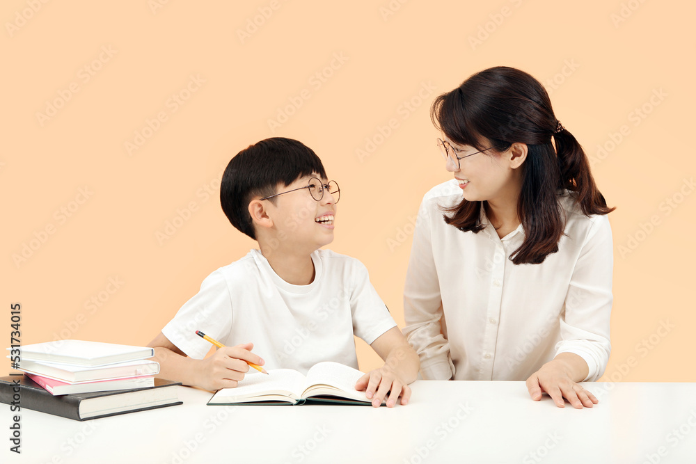 Happy learning time Children who study with a teacher or mother smiling brightly and having fun
Happy learning time Children who study with a teacher or mother smiling brightly and having fun