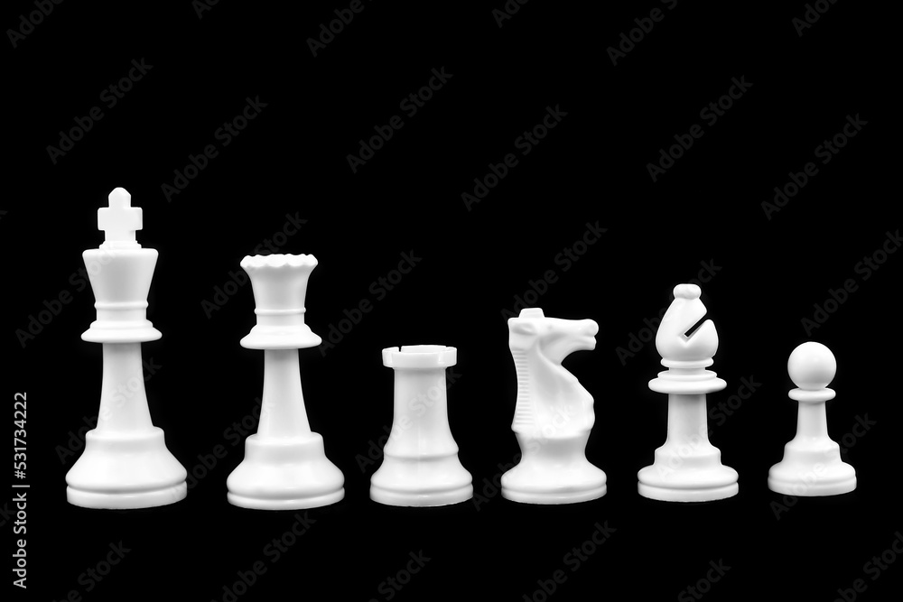 White chess pieces are isolated on a black background
White chess pieces are isolated on a black background