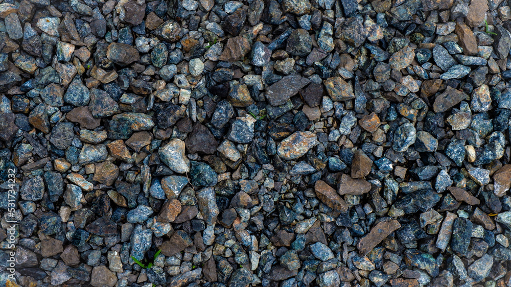Gravel is a small rock, usually derived from crushed granite. Small in size, usually used for the construction of buildings and roads. Gravel is a small rock, usually derived from crushed granite. Small in size, usually used for the construction of buildings and roads.