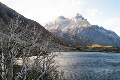 Beautiful landscape of the Nordenskjold lake and Cordillera del Paine in autumn photo