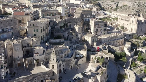 Aerial view on the Sassi di Matera, located in Basilicata, Italy. They represent the historic center of the city and are a World Heritage Site. They are rupestrian architectures carved into the rock. photo