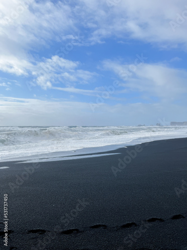 Iceland black sand beach at Reynisfjara Vik. Beautiful Iceland nature coastline © Sam Foster