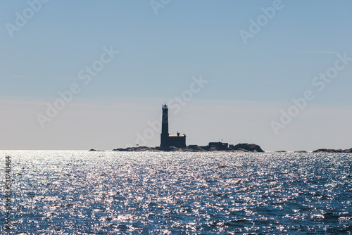 Bengtskär Lighthouse, summer view of Bengtskar island in Archipelago Sea, Finland, Kimitoön, Gulf of Finland sunny day photo