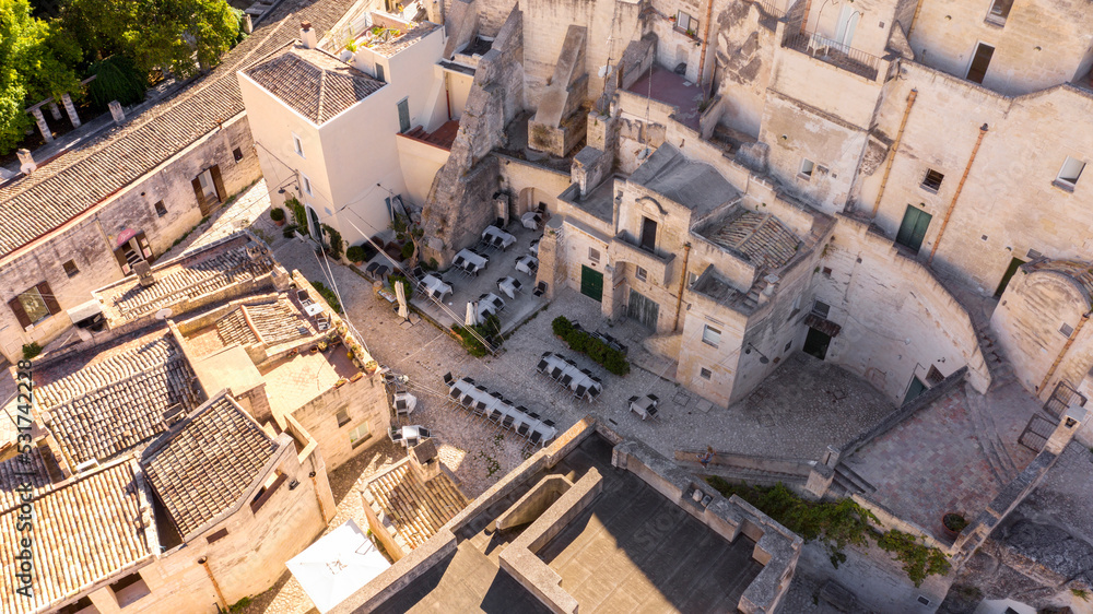 Aerial view on the Sassi di Matera, located in Basilicata, Italy. They represent the historic center of the city and are a World Heritage Site. They are rupestrian architectures carved into the rock.