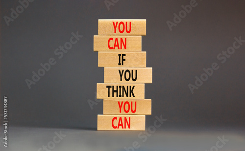 You can symbol. Concept words You can if you think you can on wooden blocks on a beautiful grey table grey background. Business motivational and you can concept.