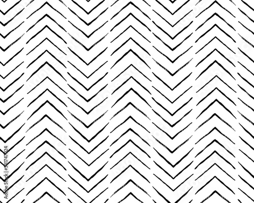 Hand crafted Black and white ethnic, geometric seamless pattern. Vector scandinavian background with brush ink zigzag. Simple pattern. Perfect for fabric, wrapping paper, textile, home decor
