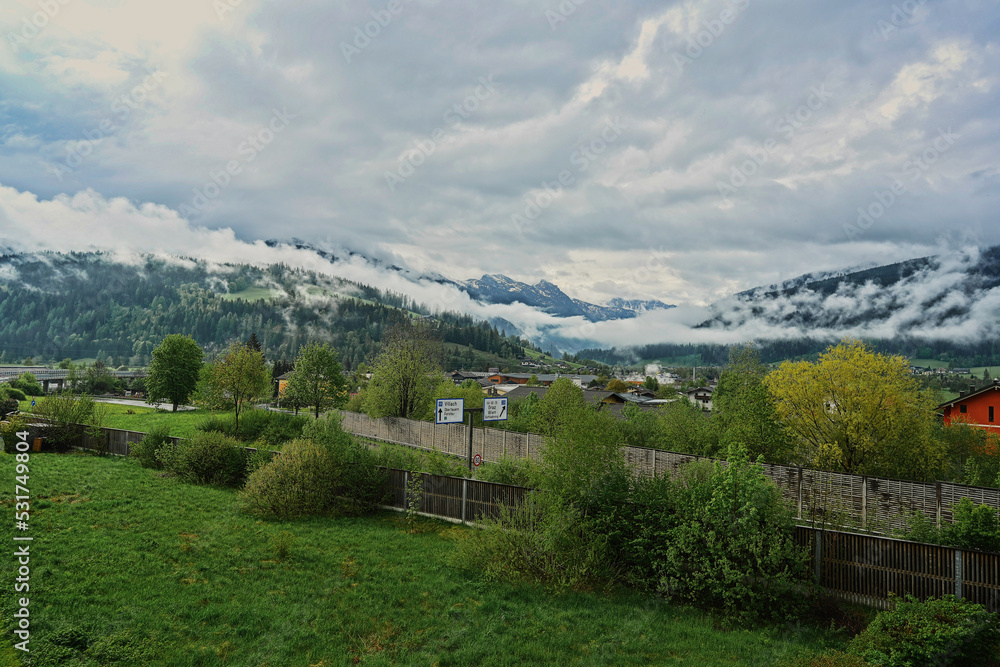 View of the yard of the house from balcony at mountain Austria.