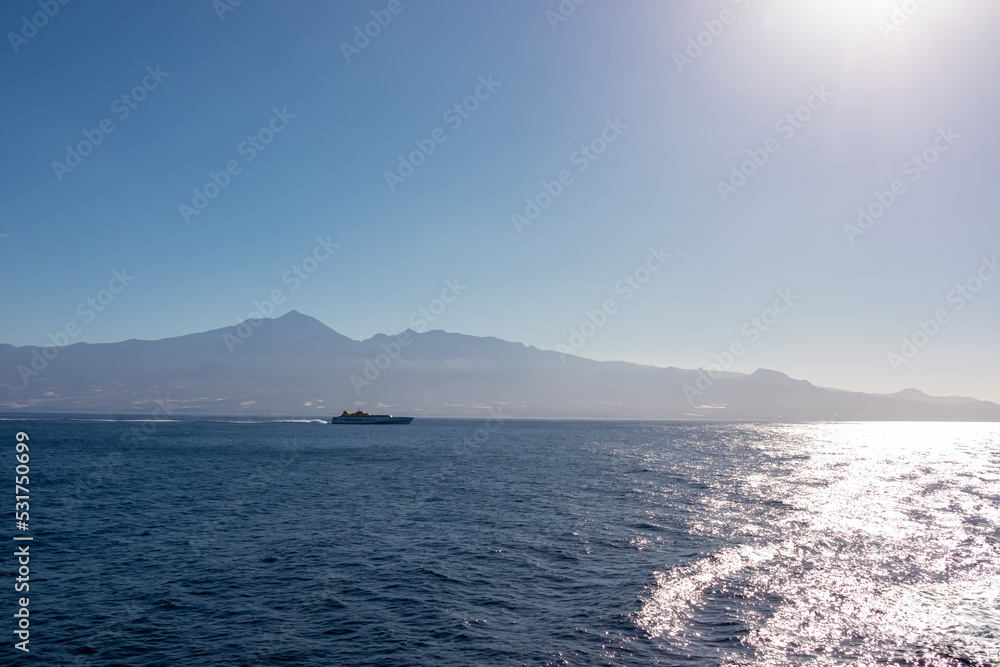 Scenic view on passenger ferry driving on sea connection between port of San Sebastian de La Gomera and Los Cristianos, La Gomera, Tenerife, Canary Islands, Spain, Europe. Island hopping vacation Scenic view on passenger ferry driving on sea connection between port of San Sebastian de La Gomera and Los Cristianos, La Gomera, Tenerife, Canary Islands, Spain, Europe. Island hopping vacation
