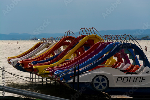 Parking water bikes in the beach of lake Balaton