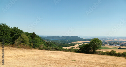 Eifellandschaft mit Blick auf den Laacher See im Hintergrund im Landkreis Mayen-Koblenz, Rheinland-Pfalz. Aussicht vom Premiumwanderweg Traumpfad Riedener Waldsee. photo