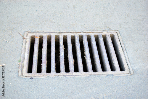 Iron manholes on the road in the city.