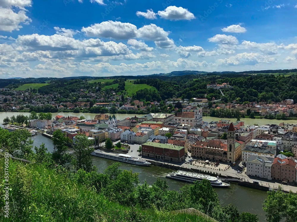 Fototapeta premium The historical city of Passau seen from Veste Oberhaus on a beautiful day in spring