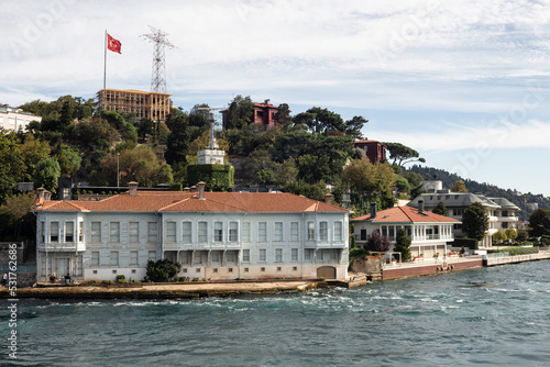 View of historical mansion by Bosphorus in Kandilli area of Asian side of Istanbul. It is a sunny summer day. Beautiful scene. photo