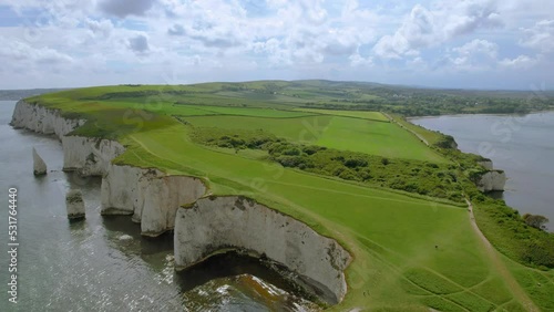 The drone aerial footage of Old Harry Rocks. Old Harry Rocks are three chalk formations, including a stack and a stump, located at Handfast Point, on the Isle of Purbeck in Dorset, southern England. photo