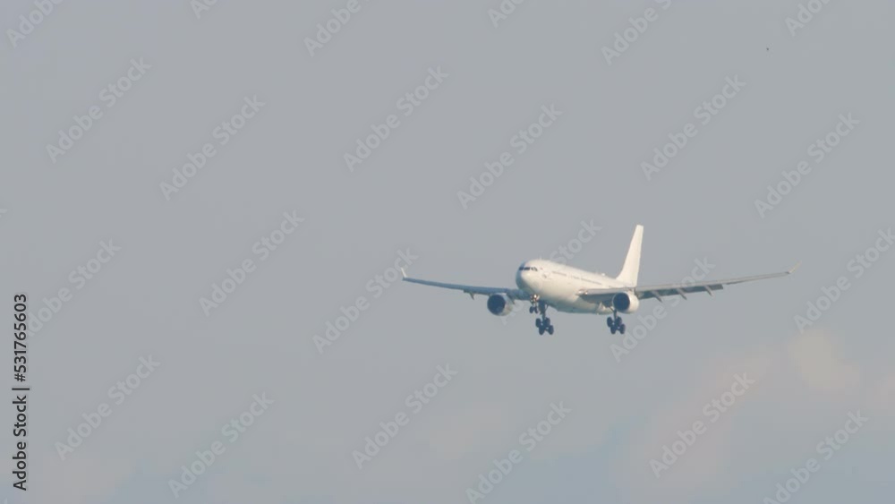 Wide body airlineer approaching to land at Sochi airport. Airliner landing gear release and ready for landing Wide body airlineer approaching to land at Sochi airport. Airliner landing gear release and ready for landing