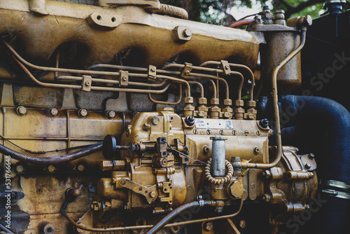 Old yellow engine decorated in vintage style.  