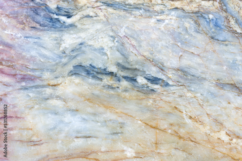Natural stone marble rock surface by the stream. Stone marble texture background.Selective focus. Natural stone marble rock surface by the stream. Stone marble texture background.Selective focus.