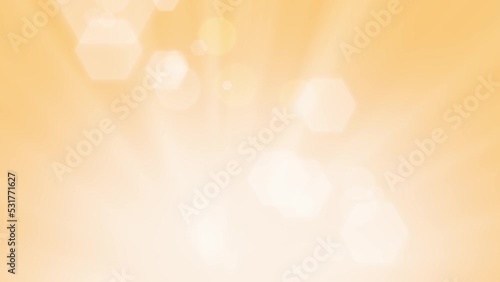 abstract light background with bokeh and rays on summer holiday