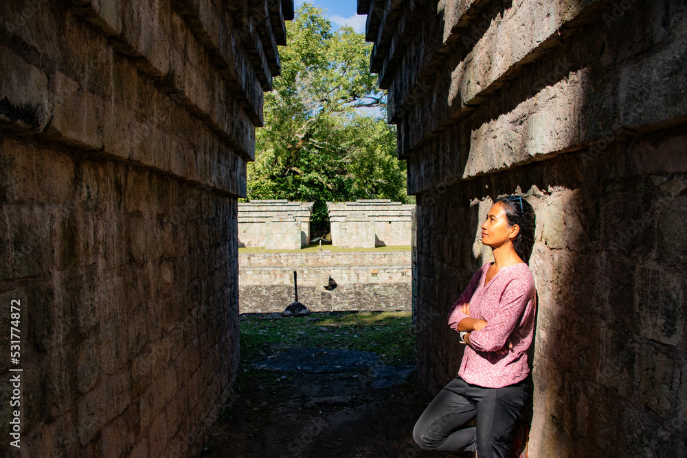 Tourist in the Copan Mayan Ruins, Copan Ruinas, Honduras Tourist in the Copan Mayan Ruins, Copan Ruinas, Honduras