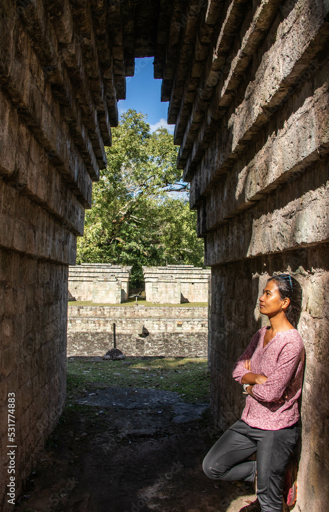 Tourist in the Copan Mayan Ruins, Copan Ruinas, Honduras Tourist in the Copan Mayan Ruins, Copan Ruinas, Honduras
