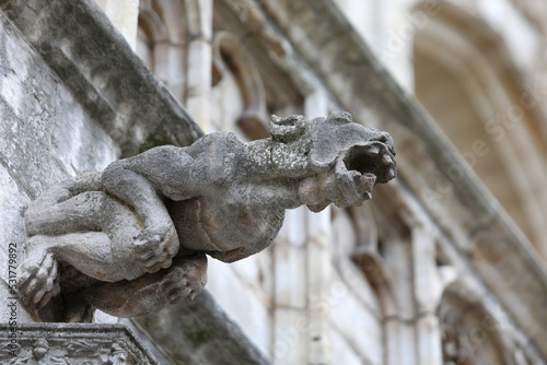 Quadro em tela Monstrous statue with almost human features called gargoyle on the historic buil