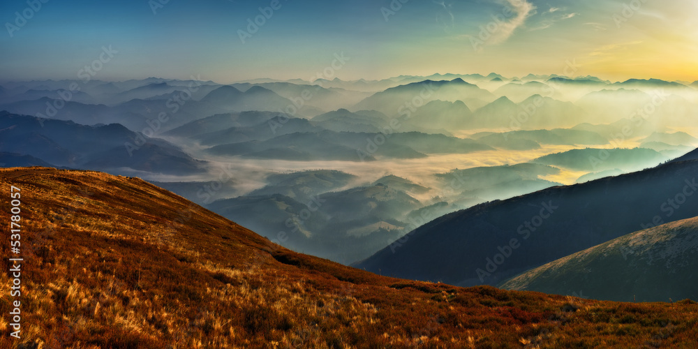 Fototapeta premium silhouettes of morning mountains. foggy morning in the Carpathians. Mountain landscape