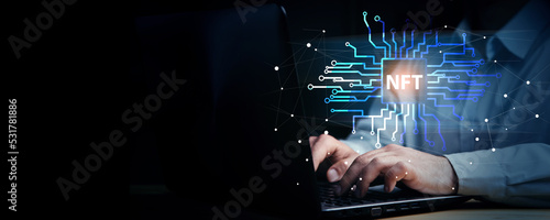 man working computer with nft icon