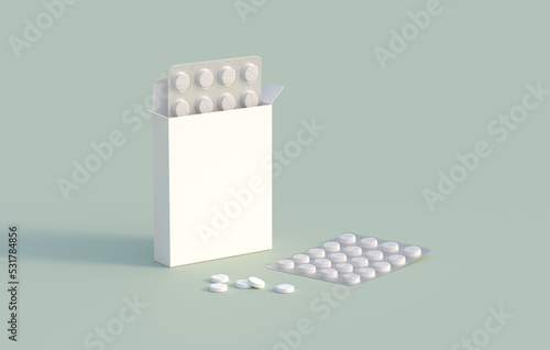 Foto White circle pills in blister pack in cardbox packaging