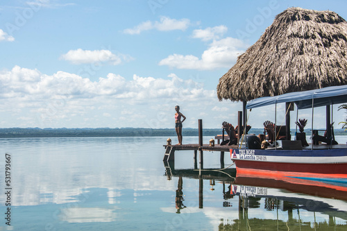 Dock and palapa hut on beautiful Lake Peten Itza, El Remate, Petén, Guatemala Fototapet