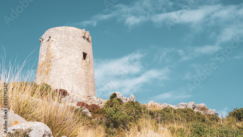 Albercutx watchtower (Talaia d'Albercuix) is located high above the Mediterranean Sea at 380 meters on top of mountain in Mallorca, Spain. photo