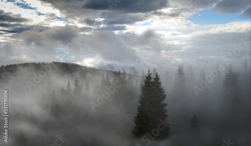 Incredible view of the Carpathian mountains early in the morning. sunrise in the mountains. Cloudy sky after rainy night on the top of the hill. Mountain valley at sunrise. Rain drops on lens
