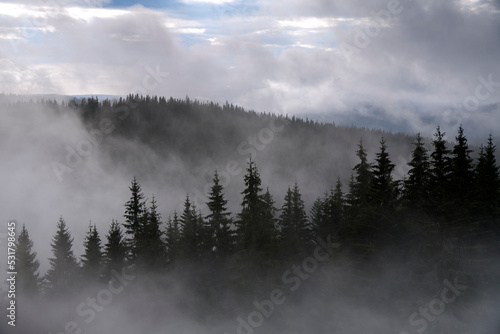 Incredible view of the Carpathian mountains early in the morning. sunrise in the mountains. Cloudy sky after rainy night on the top of the hill. Mountain valley at sunrise. Rain drops on lens © Василь Івасюк