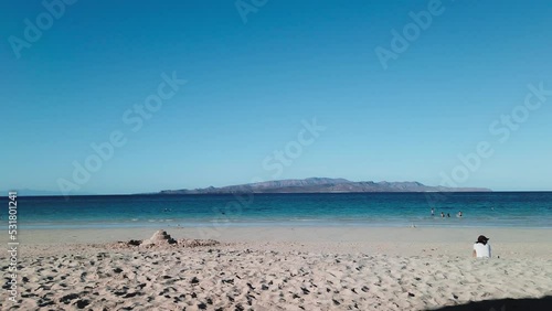 Tecolote beach people ralaxing, view Espiritu santo Island, baja california sur 15 january 2022 photo