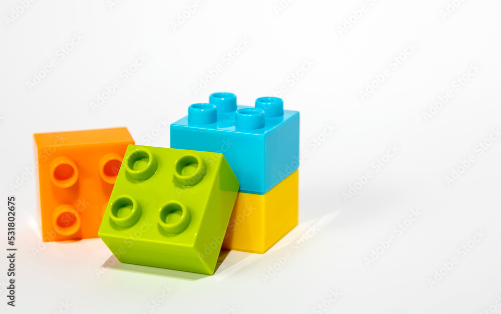 Children's toys. Colorful construction plastic game blocks isolated on white background. Children's toys. Colorful construction plastic game blocks isolated on white background.