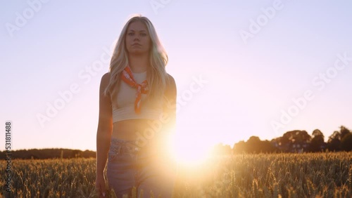 Wallpaper Mural Beautiful Young Woman Walking Through the Wheat Field in Soft Lights of Sunset Torontodigital.ca