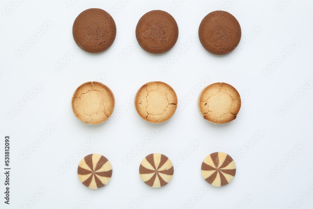 Sweet delicious homemade cookies on white background, top view