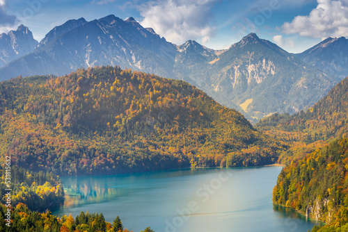 Fototapeta Naklejka Na Ścianę i Meble -  Alpsee lake at golden autumn from above, German Alps, Bavaria, Germany