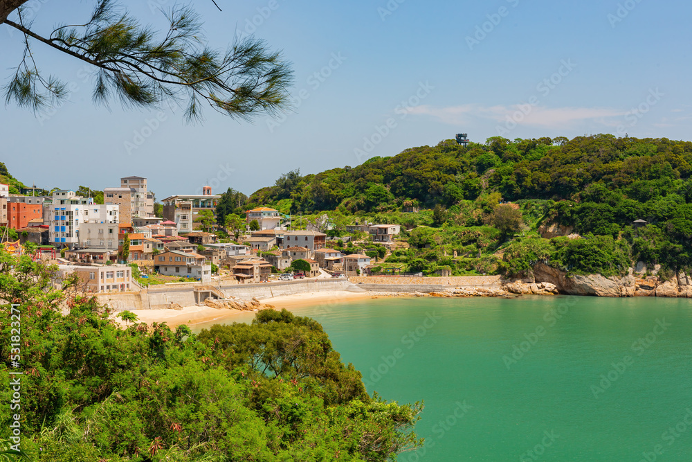 Sunny view of the town cityscape with beach view