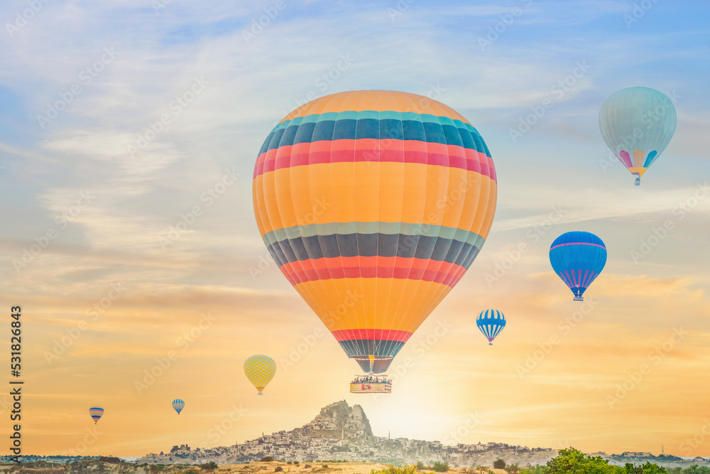 Obraz premium hot air balloons over Goreme town in Cappadocia Turkey during morning of sunrisie