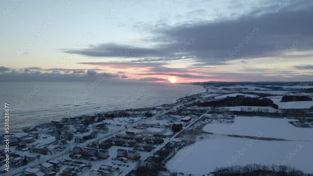 Relaxing and calming aerial view of winter landscape with snowy beach Relaxing and calming aerial view of winter landscape with snowy beach