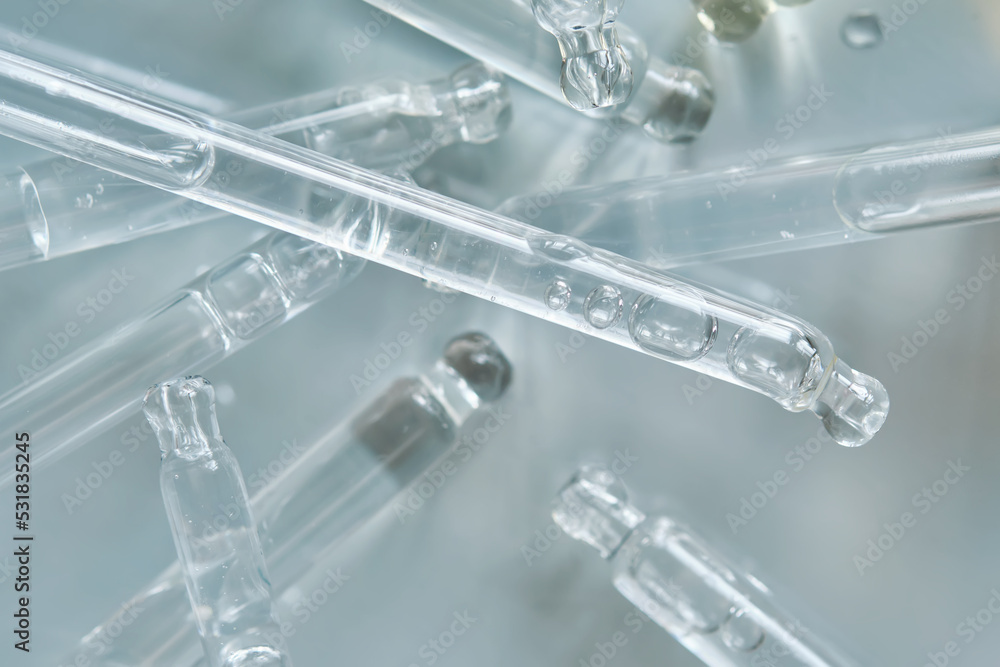 There are a lot of pipettes from cosmetics in one photo. There are a lot of pipettes from cosmetics in one photo.