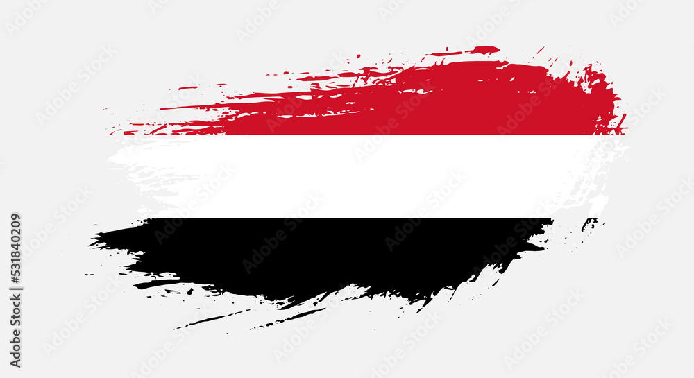 Fototapeta premium Free hand drawn grunge flag of Yemen on isolated white background