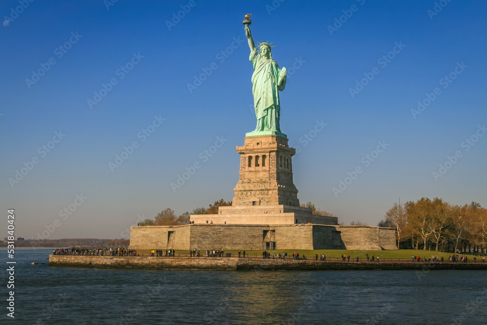 Statue of Liberty and clear sky at sunset, New York City, United States