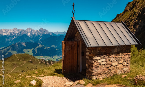 Beautiful alpine summer view with a chapel at the famous Wildseelodersee lake, Fieberbrunn, Tyrol, Austria photo