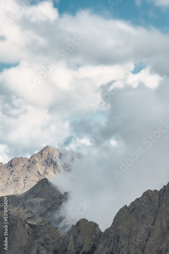 Vertical cloud landscape in the mountains