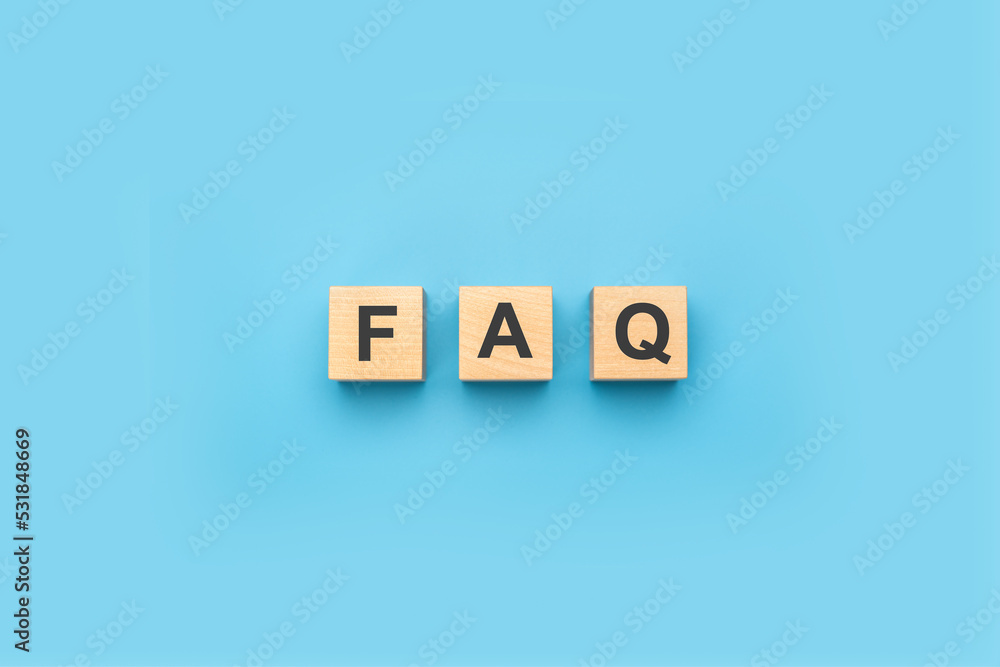FAQ frequently asked questions text on wooden cubes. blue background. information, problem and solution concepts. FAQ abbreviation FAQ frequently asked questions text on wooden cubes. blue background. information, problem and solution concepts. FAQ abbreviation