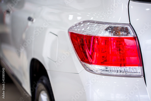 Toyota. Headlight of modern prestigious car close up. Brilliant glass car headlight with highlights from the lighting in the showroom. Sale of new commercial cars. Shymkent Kazakhstan April 15, 2022